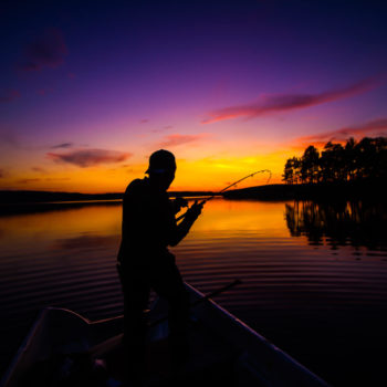 Fishing at sunset in Swedish Lapland