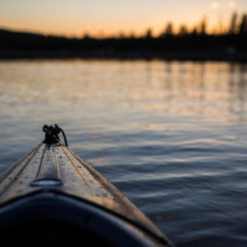 Canoe on a lake at sunset in Swedish Lapland